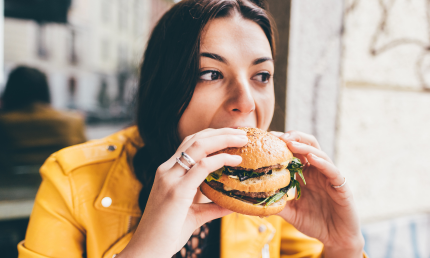 Girl eating Burger